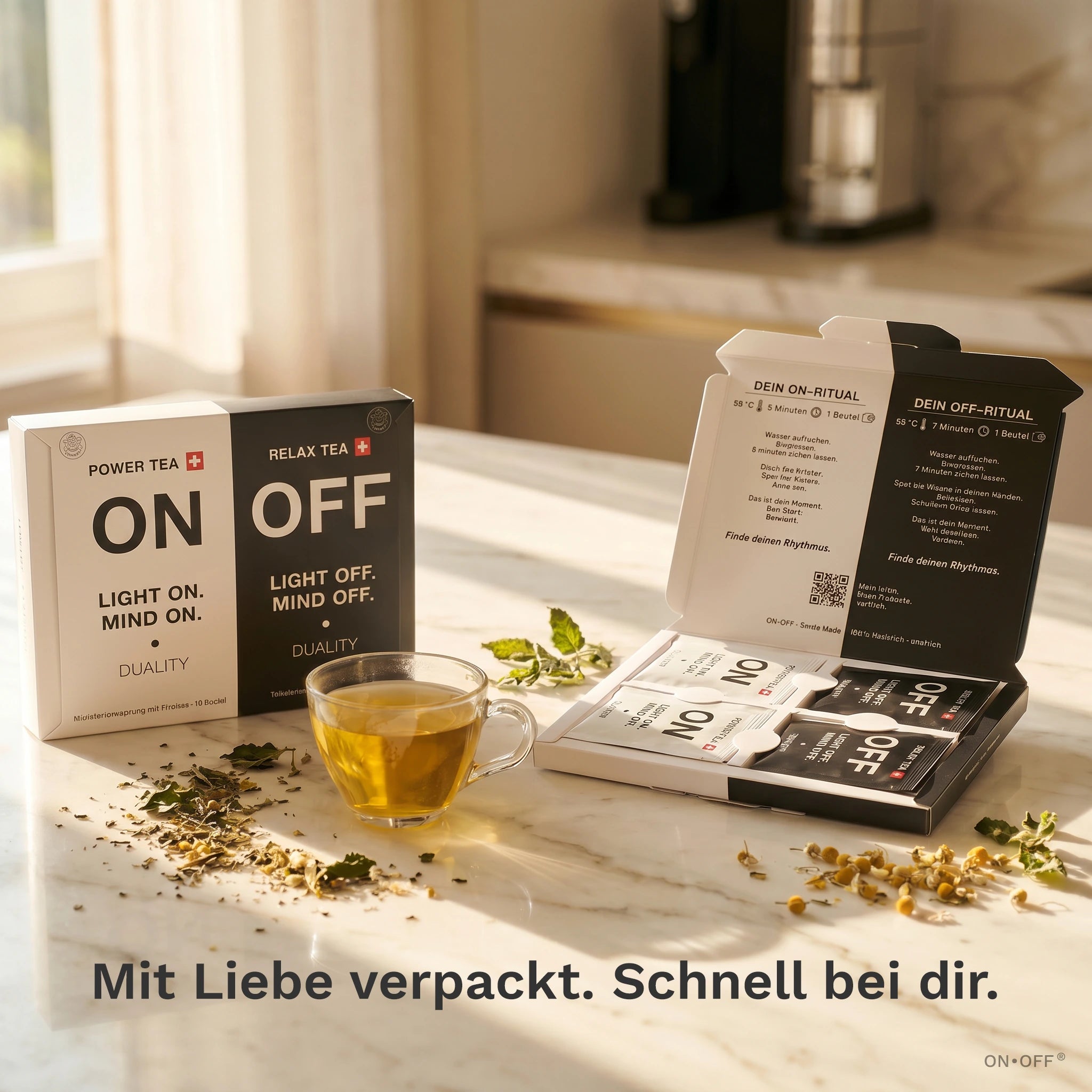 ONOFF Duality Tee-Box geschlossen und offen – ON POWER TEA und OFF RELAX TEA Sachets sichtbar, Ritual-Anleitung im Deckel, Premium-Verpackung Swiss Made